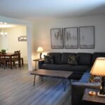 a living room with a couch and table