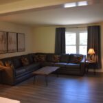 a living room with a couch and a table