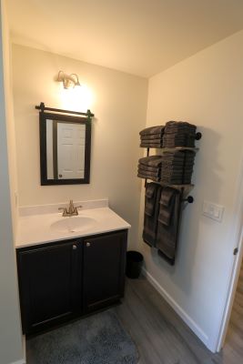 a bathroom with a sink and towels